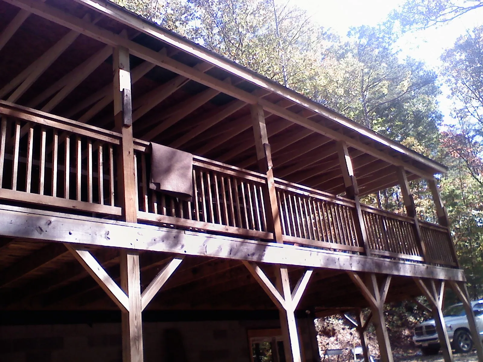 Timber framing under a new elevated porch and deck — Roof Leak Repair in Eaton Center by Roofing Brothers